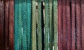 Coloured Leather Belt Background hanging vertically