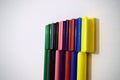 Coloured marker pens attached together
