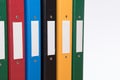 Coloured office document folders with blank labels Royalty Free Stock Photo