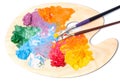 Coloured oil paint and brushes on the palette Royalty Free Stock Photo