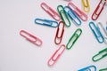 Coloured paper clips on a white background Royalty Free Stock Photo