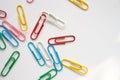 Coloured paper clips on a white background Royalty Free Stock Photo