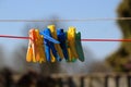 Coloured pegs on a washing line Royalty Free Stock Photo