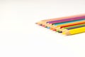 Coloured pencils lined up close up. Royalty Free Stock Photo