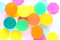 Coloured rubber ball on polka dot background