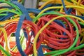 Coloured rubber bands in close up, selective focus and blur