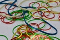 Coloured rubber bands in close up, selective focus and blur