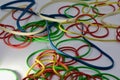 Coloured rubber bands in close up, selective focus and blur