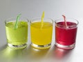 Coloured soft drinks. Conceptual image Royalty Free Stock Photo