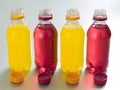 Coloured soft drinks. Conceptual image Royalty Free Stock Photo
