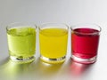Coloured soft drinks. Conceptual image Royalty Free Stock Photo