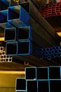Coloured square and round steel tubes Royalty Free Stock Photo