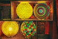 Coloured stained glass lamps mosaic colored in dark background shelves