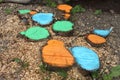 Coloured stubs with grass and sawdusts on a ground in a dacha garden