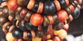 Coloured wooden bead bracelets on display as ethnic jewellery Royalty Free Stock Photo