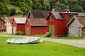 Coloured wooden buildings and the boat Royalty Free Stock Photo