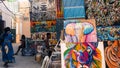 Alley/ street of Stonetown, Zanzibar with artwork for sale on display