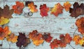 Colourful autumn leaves on a blue wooden background Royalty Free Stock Photo