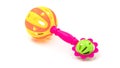 Colourful baby rattle with balls. White isolated background. Royalty Free Stock Photo