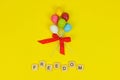 Colourful balloons with red bow the wooden letter written freedom. Balloon symbolise as freedom Royalty Free Stock Photo