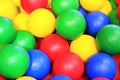 Closeup photo with colorful balls for kids - green, yellow, red and blue Royalty Free Stock Photo