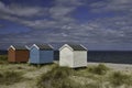 Colourful beach huts on Findhorn Beach, Moray Firth, Scotland