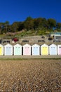 Colourful Beach Huts on The Lyme Regis Coast Line on the English South Coast Seaside Royalty Free Stock Photo