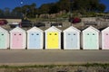 Colourful Beach Huts on The Lyme Regis Coast Line on the English South Coast Seaside Royalty Free Stock Photo