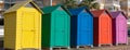 Colourful beach huts in Spain bright colours with orange green blue yellow purple
