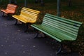 3 Colourful Benches in a Berlin Park in the Fall