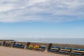 Colourful benches on Wallasey beach promenade