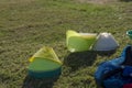 Colourful bibs left on a football pitch, ready for the next training session to come.