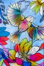 Colourful bird and flower grafitti