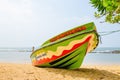 Colourful boat on background of the endless sea