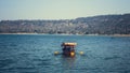 Colourful boat in scenery of lake