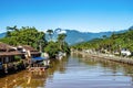 Colourful boats moored along the waterfront of Ponte do Pontal at Paraty, Brazil