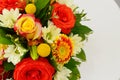 Colourful bouquet of flowers in red scale.