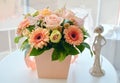 Colourful bouquet of gently flowers in hat box