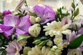 Colourful bouquet of white and lilac flowers