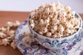 Colourful Bowl of Popcorn sprinkled with cinnamon