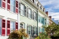 Colourful Brick Row Houses under Blue Sky with Clouds Royalty Free Stock Photo