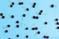 Colourful bright pattern with ripe cherry. Top view. Royalty Free Stock Photo