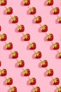 Colourful bright pattern with ripe strawberry. Top view. Pink background