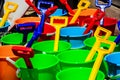 Colourful buckets and spades at children`s party.