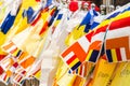 Colourful buddhist prayer flags draped at the entrance to a temp