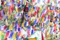 The colourful buddhist prayer flags flying high in the sky Royalty Free Stock Photo