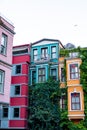 Close up of colorful buildings in Balat Istanbul with green creepers