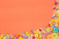 Colourful buttons on an orange background with copy space. Royalty Free Stock Photo