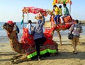 Colourful camel ride on the Somnath beach on Arabian sea Gujarat, India Royalty Free Stock Photo