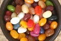 Colourful candies in a brown bowl